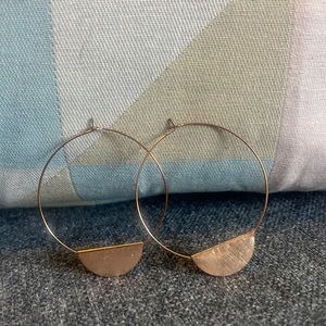 Simple gold hoop earring for everyday wear